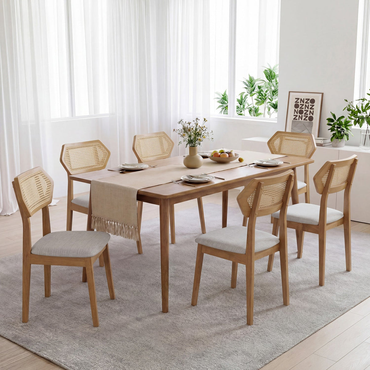 Rattan Dining Chairs set of 4 with curved caned backs in wood around a dining table on Tampa Home & Garden Store