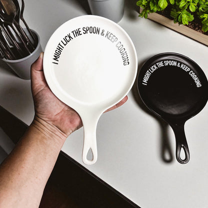 Spoon rest Lick the Spoon & Keep Cooking by Gia Roma, white ceramic with bold text on Tampa Home & Garden Store