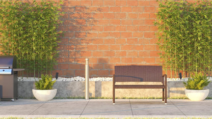 Miles Wicker Bench outdoor brown wicker with beige cushion beside grill near brick wall on Tampa Home & Garden Store