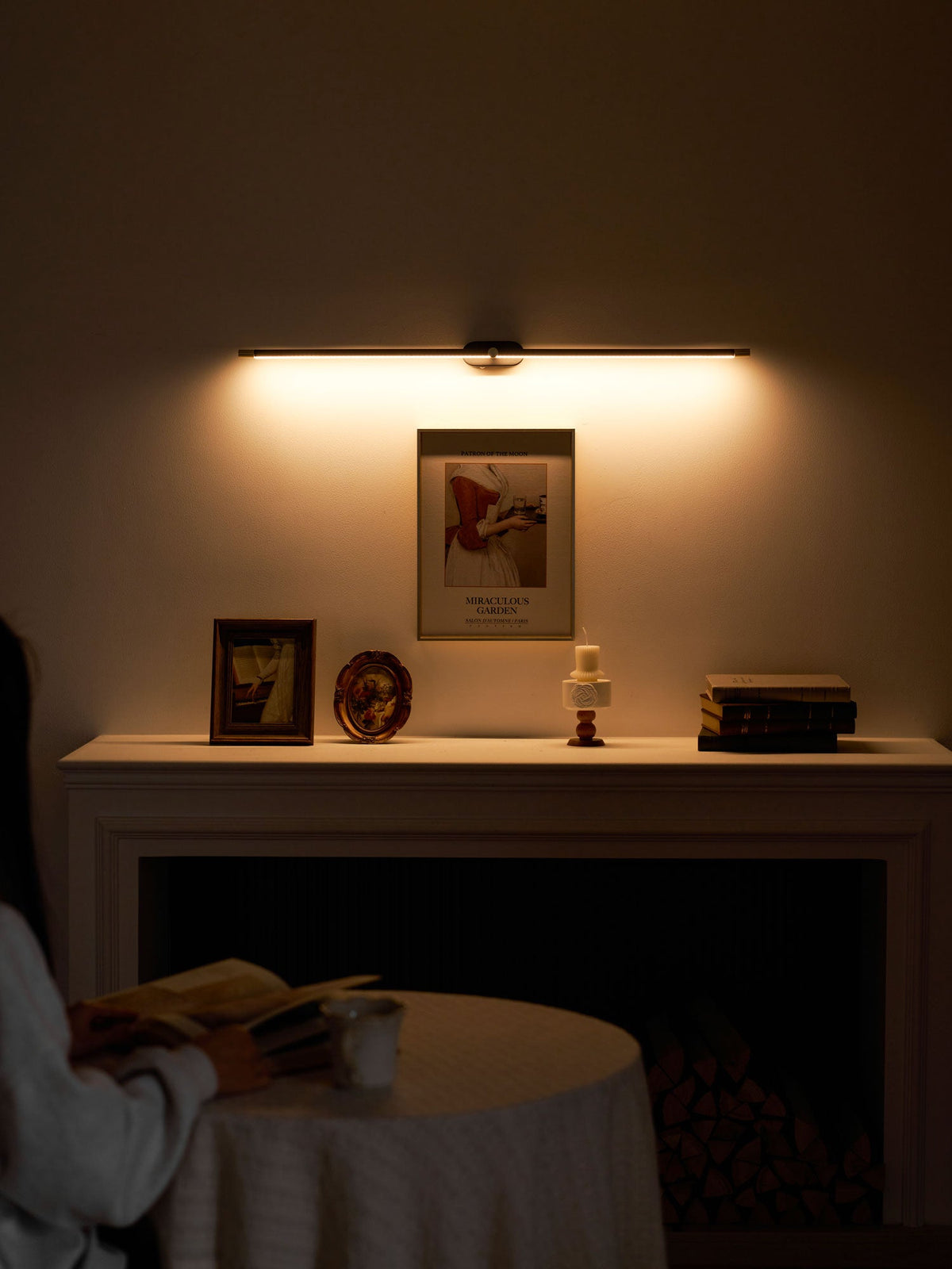 Rechargeable linear LED wall lamp Moktan Sabai with remote, cordless mirror light over mantel on Tampa Home & Garden Store