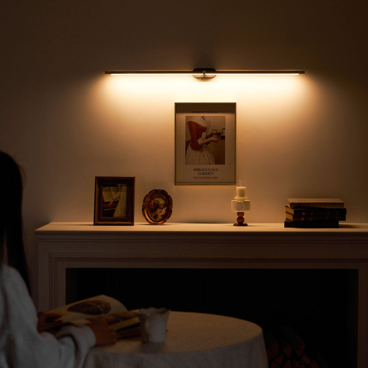 Rechargeable Moktan Sabai linear LED wall lamp with remote, cordless bar light above mantel on Tampa Home & Garden Store