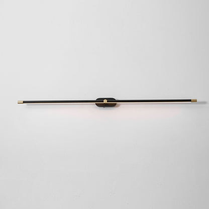 Rechargeable linear LED wall lamp Moktan Sabai in black with brass ends, wall-mounted on Tampa Home & Garden Store