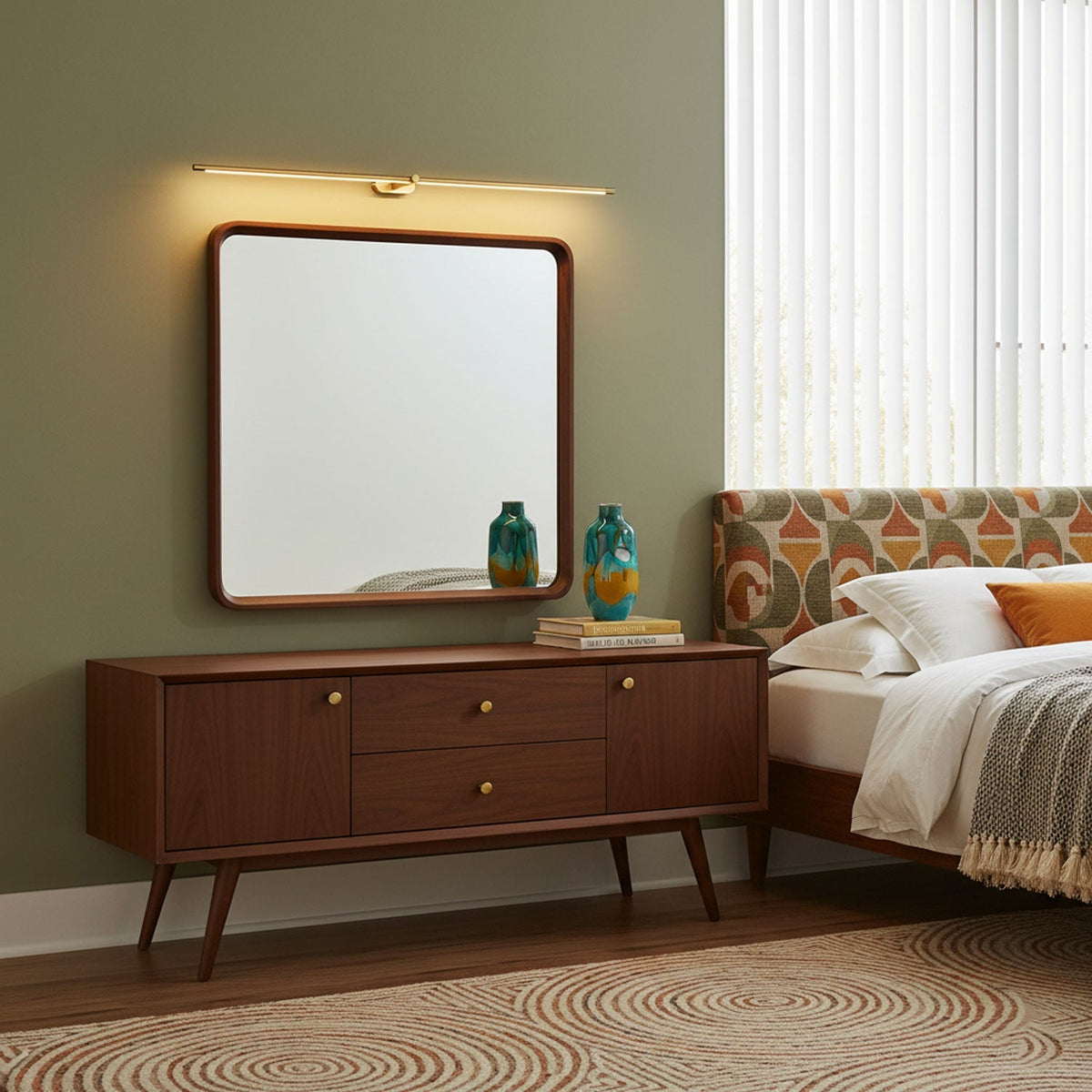 Rechargeable linear LED wall lamp with remote over wooden-framed mirror in a green bedroom on Tampa Home & Garden Store