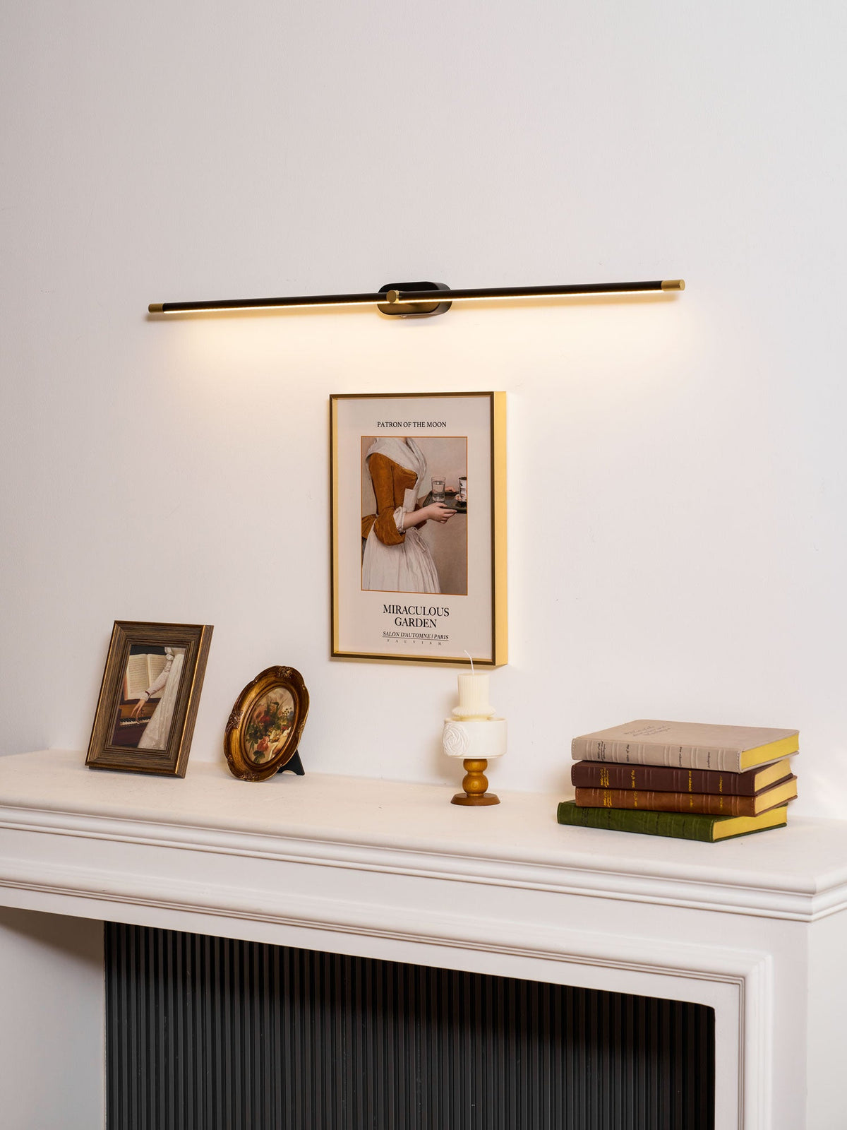 Rechargeable linear LED wall lamp by Moktan Sabai with brass ends, cordless, warm glow on Tampa Home & Garden Store