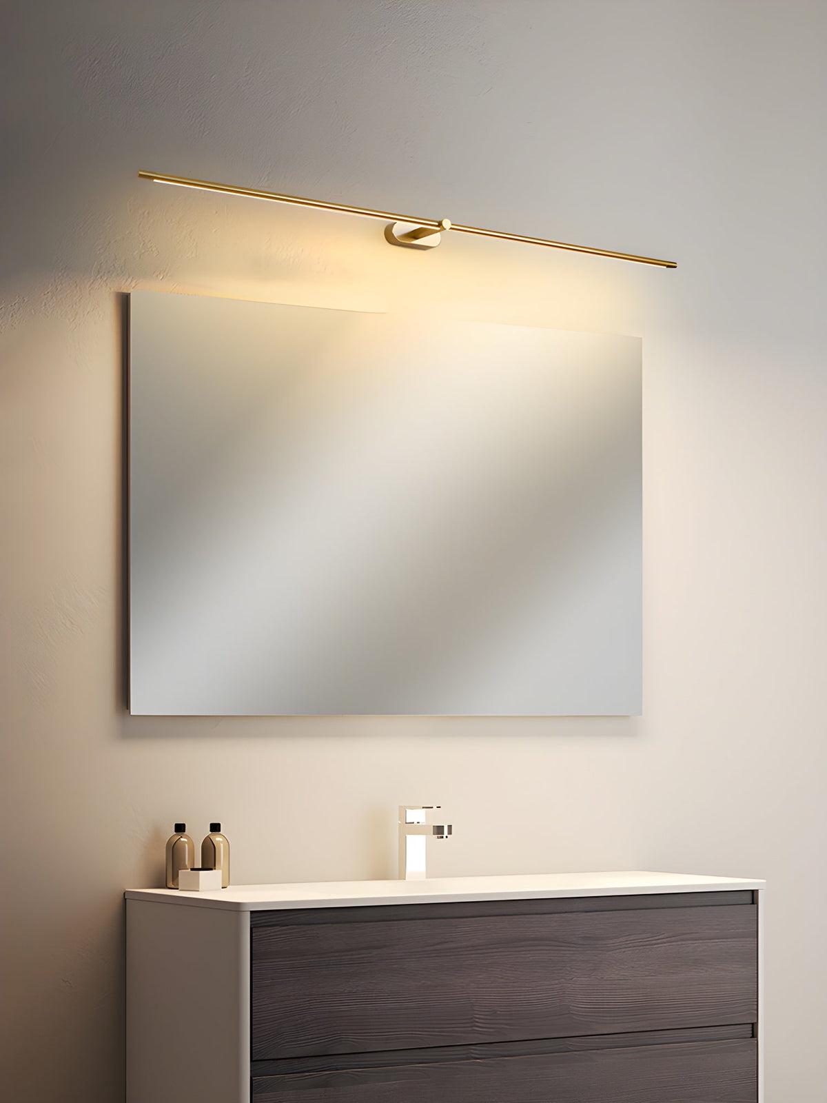 Rechargeable linear LED wall lamp with remote control, cordless mirror light in gold finish above mirror on Tampa Home & Garden Store