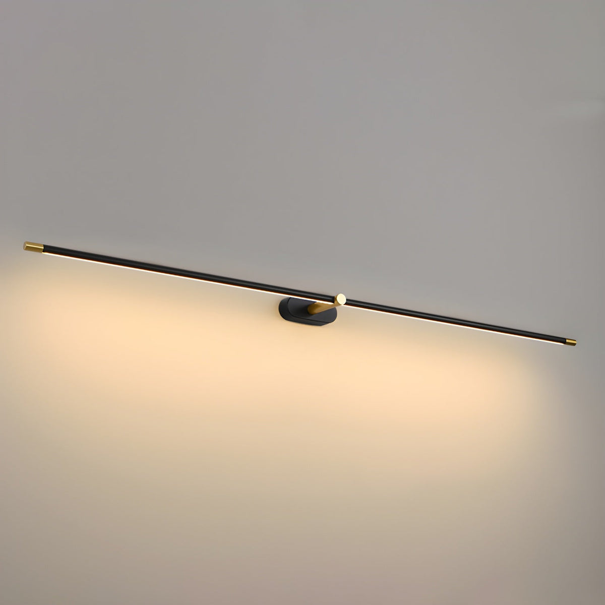 Rechargeable linear LED wall lamp with remote, black body with gold ends, wall mounted on Tampa Home & Garden Store