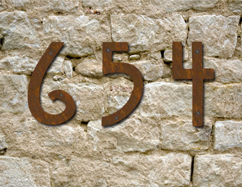 Rustic Mission Style metal house numbers 6 5 4 on a stone wall on Tampa Home & Garden Store