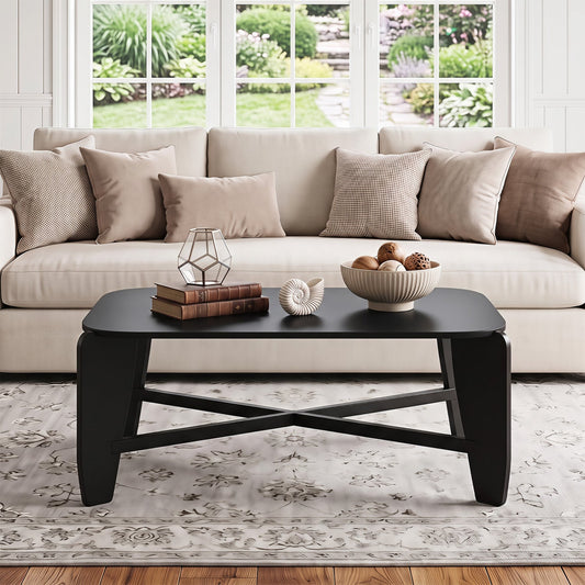 Rectangular coffee table with rubber wood cross-leg base, black finish in a living room on Tampa Home & Garden Store