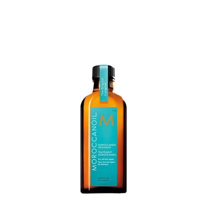 Moroccanoil Treatment Hair Oil bottle with turquoise label on amber glass by Nava Beauty on Tampa Home & Garden Store