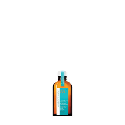 Moroccanoil Treatment Light bottle with amber glass, turquoise label and white cap on Tampa Home & Garden Store