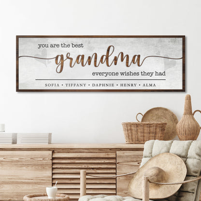 Tailored Canvases wood-framed canvas sign with grey background brown grandma script on Tampa Home & Garden Store
