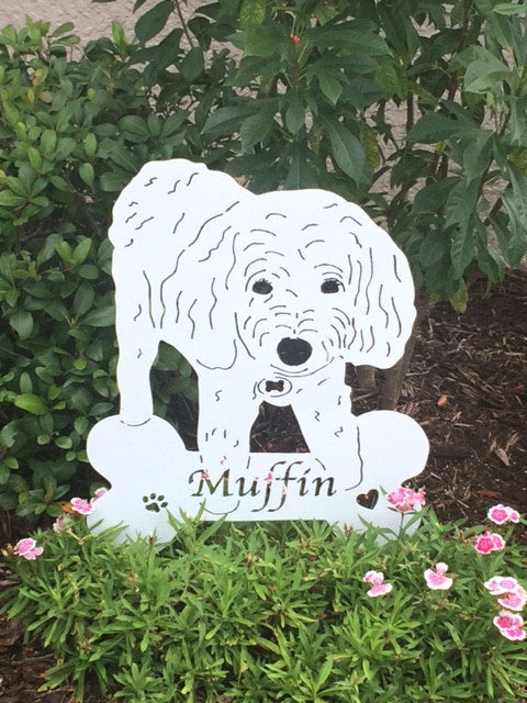 Pet garden art sign Muffin dog silhouette, white lawn ornament in a green garden on Tampa Home & Garden Store