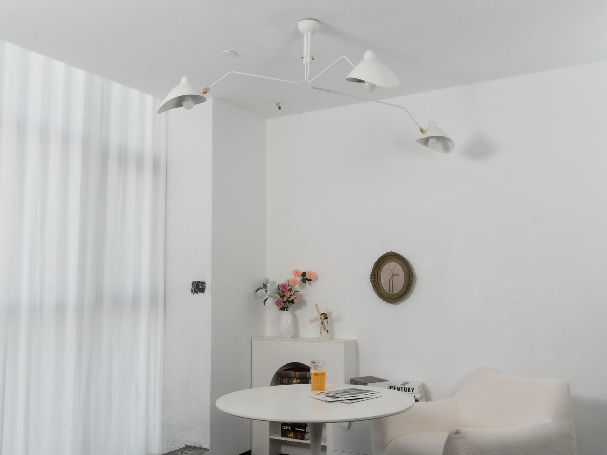 Arachnia suspended 3-arm ceiling light with rotating reflectors in white finish by Moktan Sabai on Tampa Home & Garden Store