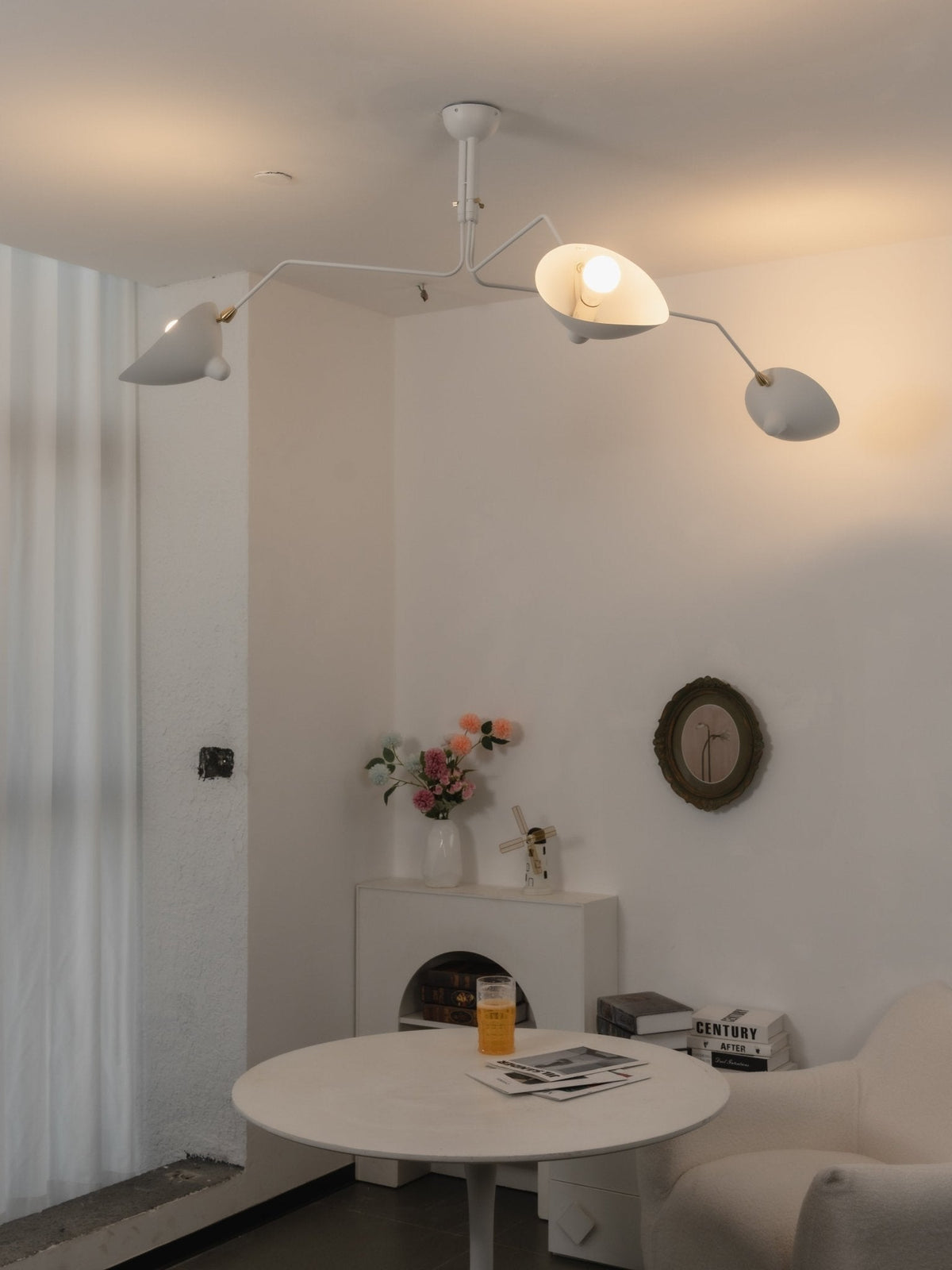 Arachnia suspended 3-arm ceiling light with rotating reflectors in white finish on Tampa Home & Garden Store