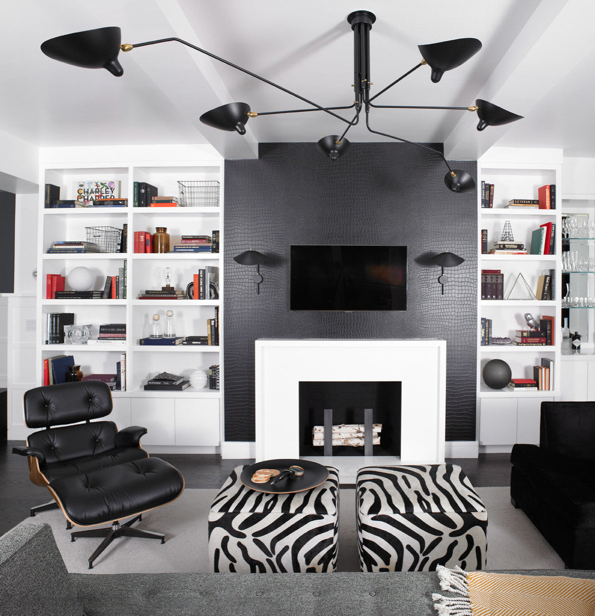 Arachnia suspended 3-arm ceiling light with rotating reflectors in black finish on Tampa Home & Garden Store