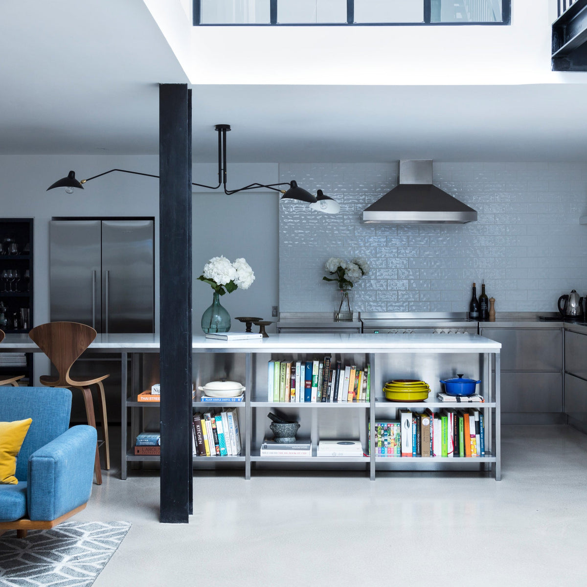 Arachnia 3-arm suspended ceiling light with rotating reflectors in black over kitchen island on Tampa Home & Garden Store