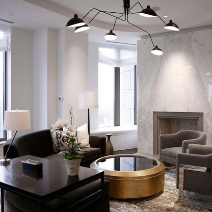 Arachnia 3-arm ceiling light with rotating reflectors, black finish in a modern living room on Tampa Home & Garden Store