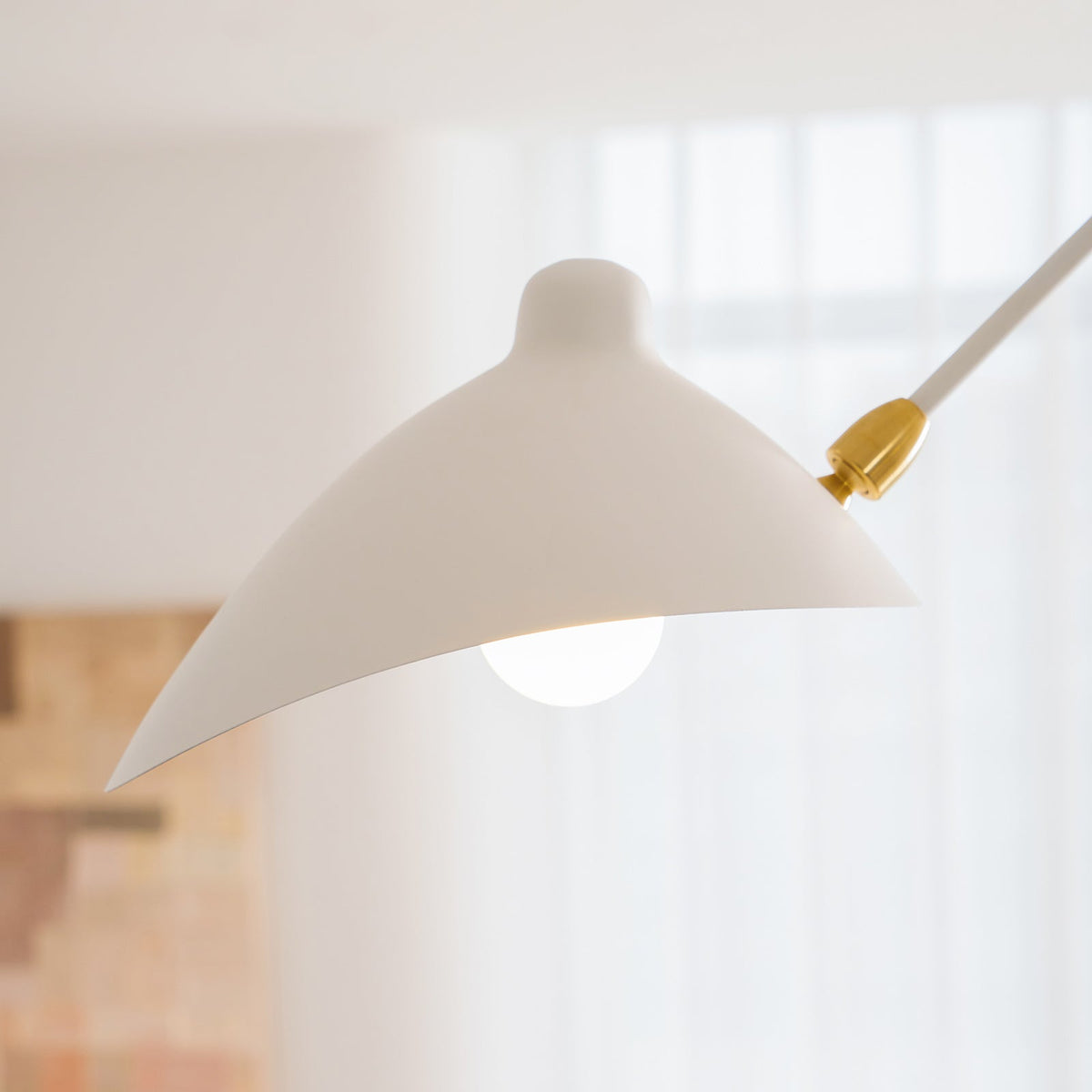 Arachnia suspended ceiling light white shade with brass accent on stem on Tampa Home & Garden Store