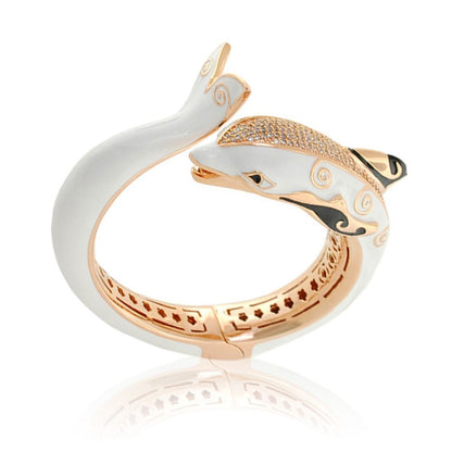 Freedom of the Seas Bangle, white enamel dolphin bracelet in rose gold with pavé accents on Tampa Home & Garden Store