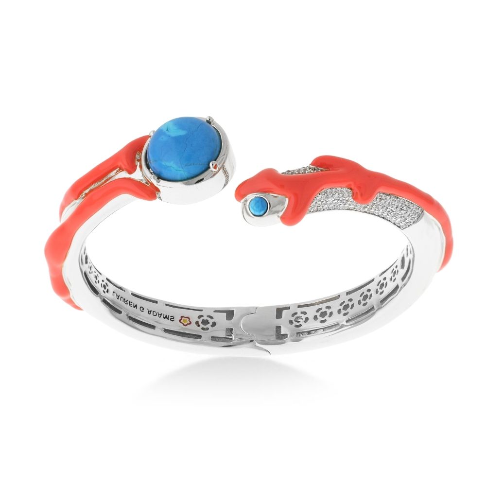 Pretty Little Things Bangle by Lauren G Adams, coral red enamel snake wrap with blue cabochons on Tampa Home & Garden Store