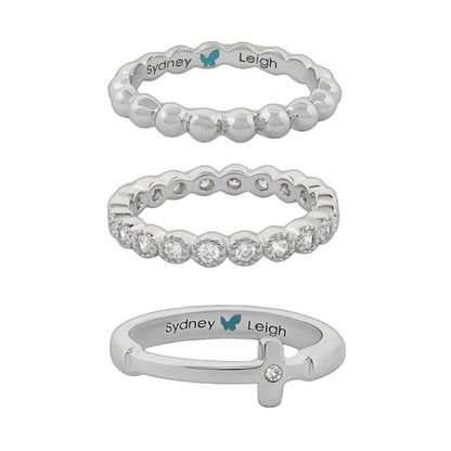 Three Sydney Leigh Cross Rings: silver-tone beaded band, pavé crystal band on Tampa Home & Garden Store