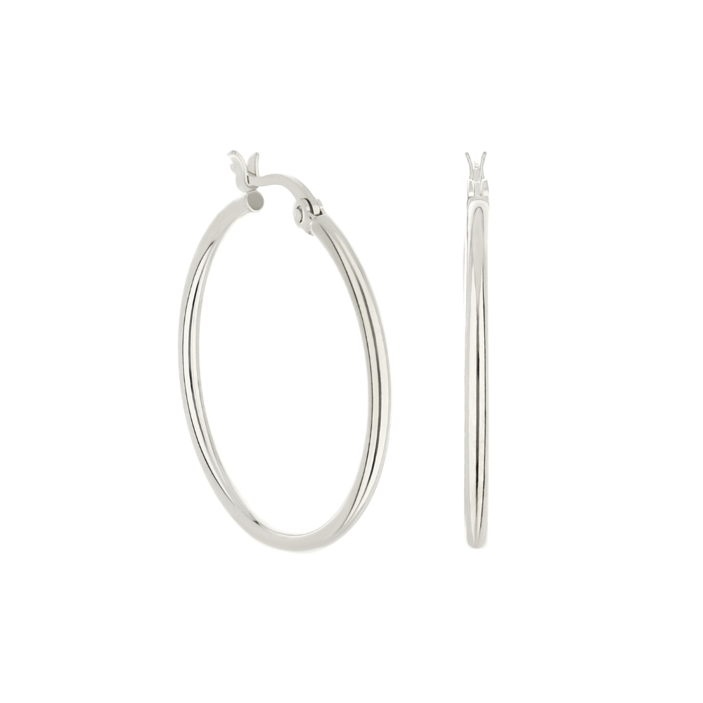Plain silver hoop earrings pair with slim, polished metal hoops on Tampa Home & Garden Store