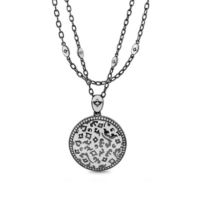 Fleur de Love pendant by Lauren G Adams; round pendant with floral pattern on chains on Tampa Home & Garden Store