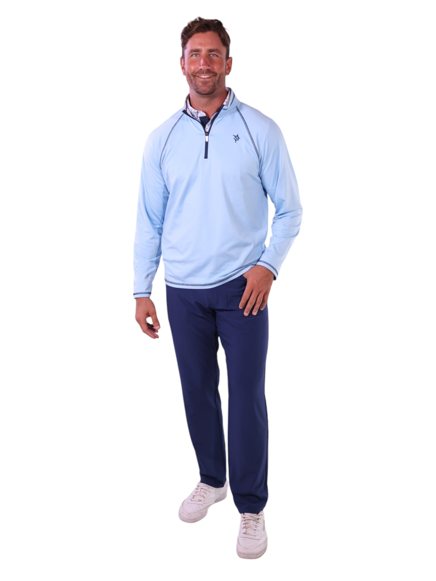 New Harbor Quarter Zip by White Water Life light blue top with navy piping worn by a man on Tampa Home & Garden Store