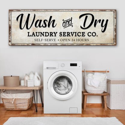 Canvas sign Wash And Dry Laundry Service Co with beige background and black lettering on Tampa Home & Garden Store