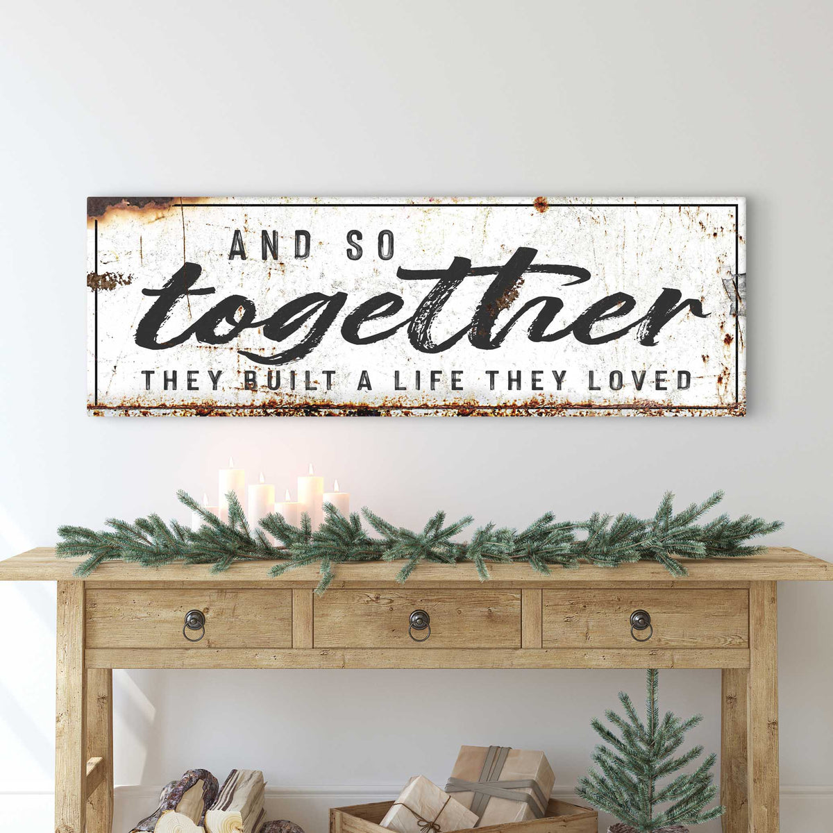 Canvas sign with distressed white background, bold black script reading And So Together They Built A Life They Loved on Tampa Home & Garden Store
