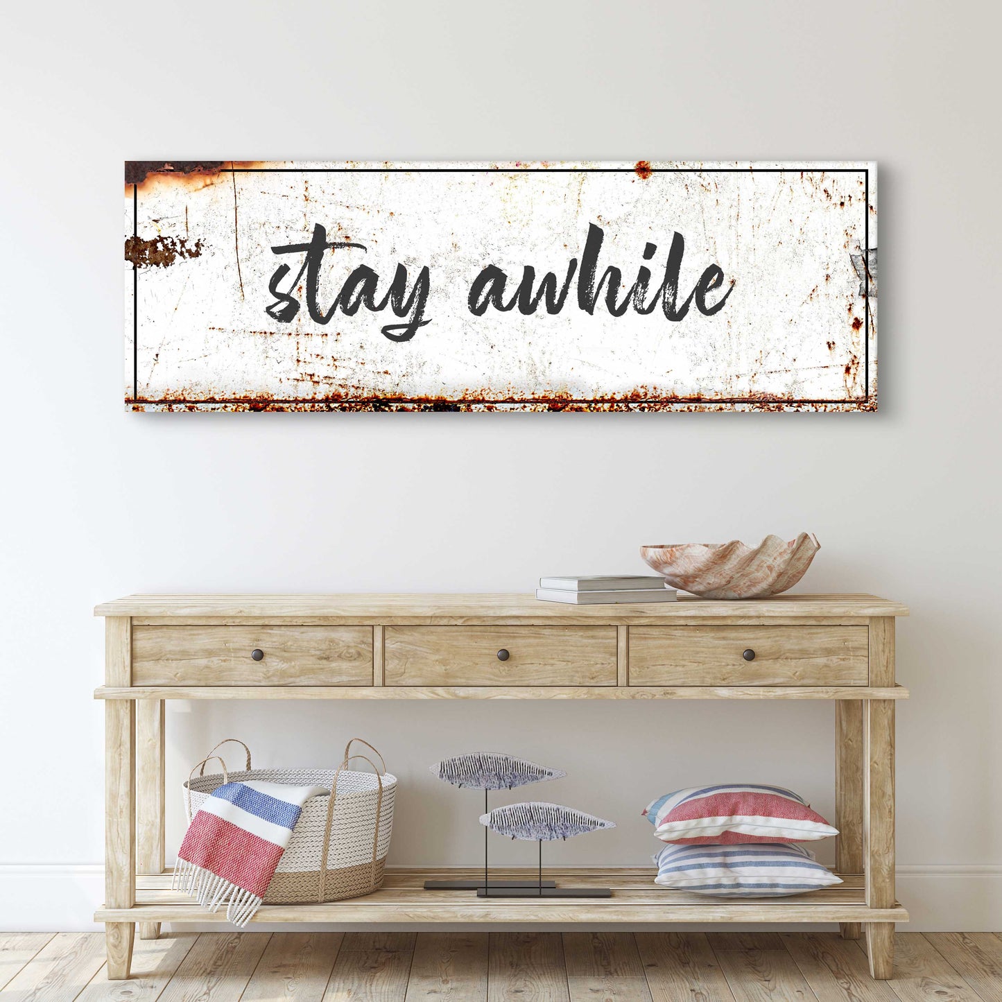 Stay Awhile Sign canvas by Tailored Canvases with distressed white surface and rust accents on Tampa Home & Garden Store
