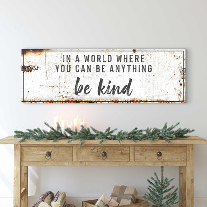 In A World Where You Can Be Anything Be Kind canvas sign with distressed white surface on Tampa Home & Garden Store
