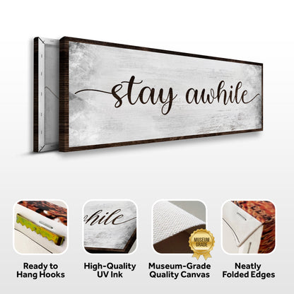 Stay Awhile Sign III canvas by Tailored Canvases with distressed white surface and dark wood frame on Tampa Home & Garden Store
