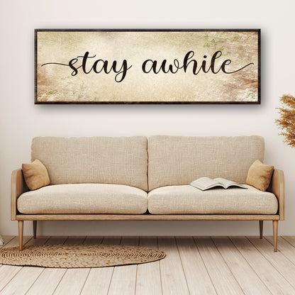 Stay Awhile Sign III canvas; black cursive text, rustic wood frame on Tampa Home & Garden Store