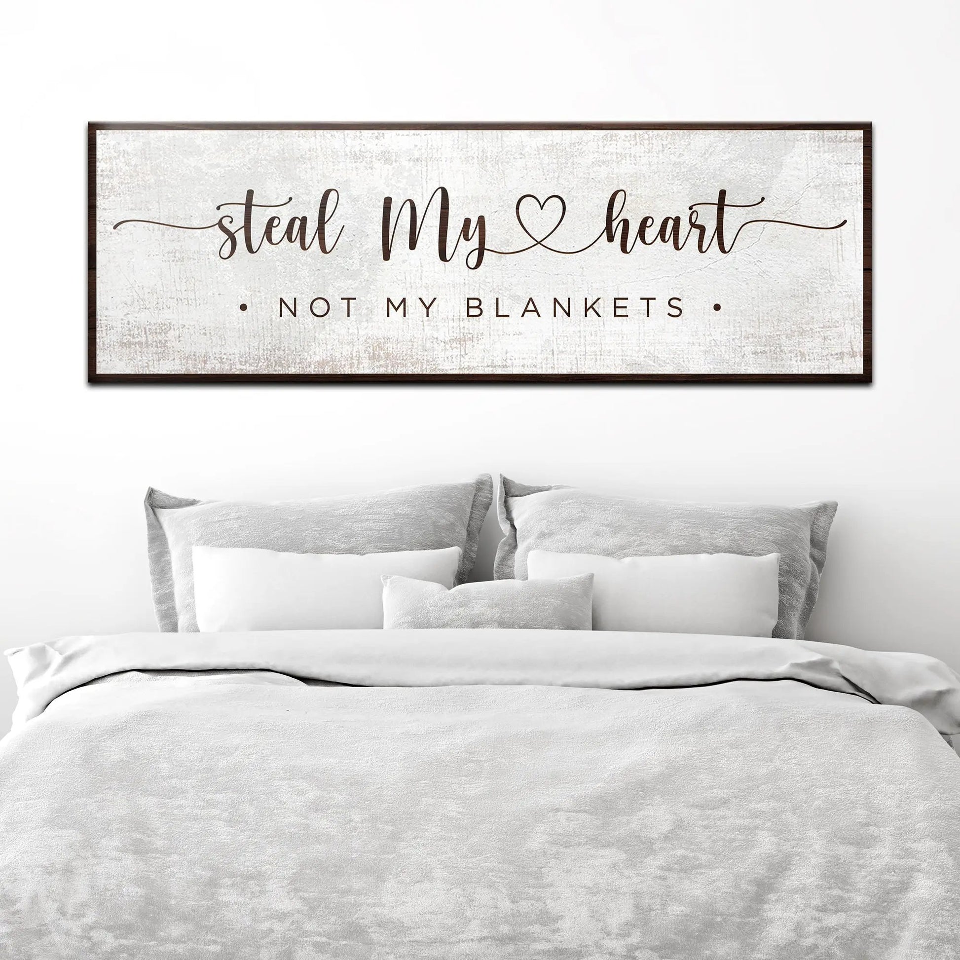 Steal My Heart Not My Blanket sign canvas with rustic gray background and dark wood frame on Tampa Home & Garden Store