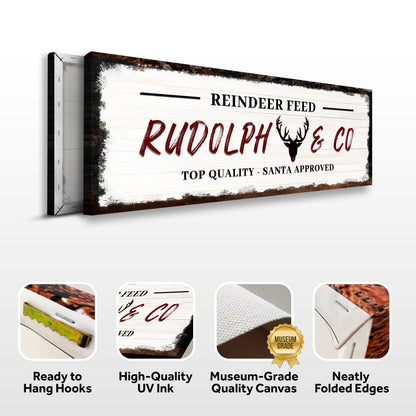 Canvas sign Rudolph & Co with whitewashed wood background and deer head silhouette on Tampa Home & Garden Store