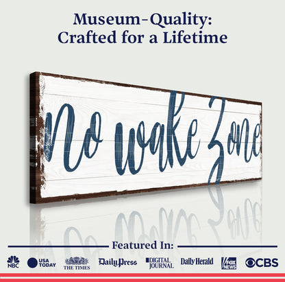 No Wake Zone XV canvas sign with distressed white wood backdrop and navy script on Tampa Home & Garden Store