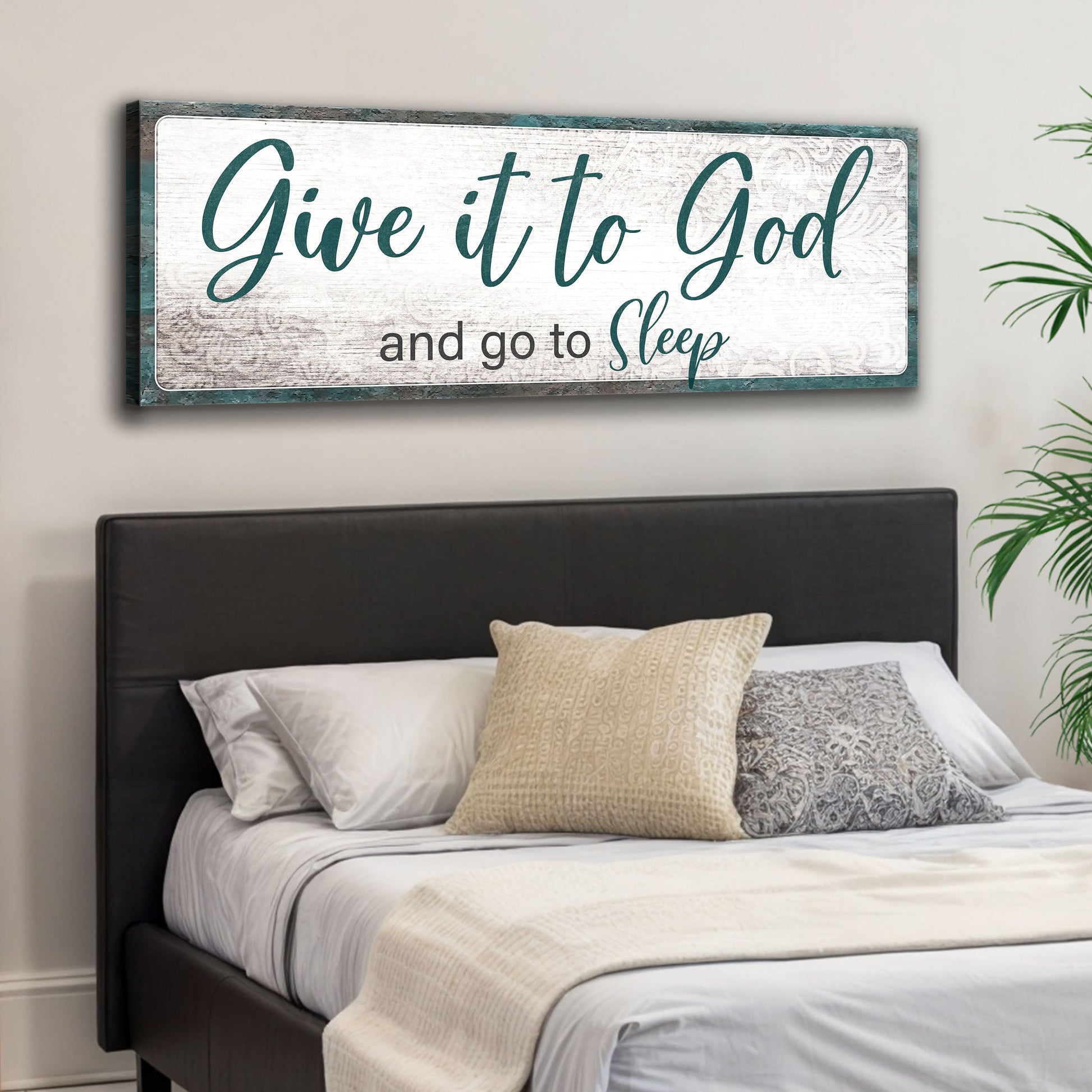 Canvas sign with teal script Give It To God and Go To Sleep on whitewashed wood with teal border on Tampa Home & Garden Store