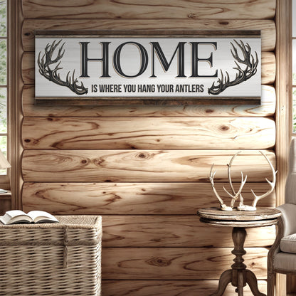 Home Is Where You Hang Your Antlers sign canvas with rustic gray panel and antler accents on Tampa Home & Garden Store