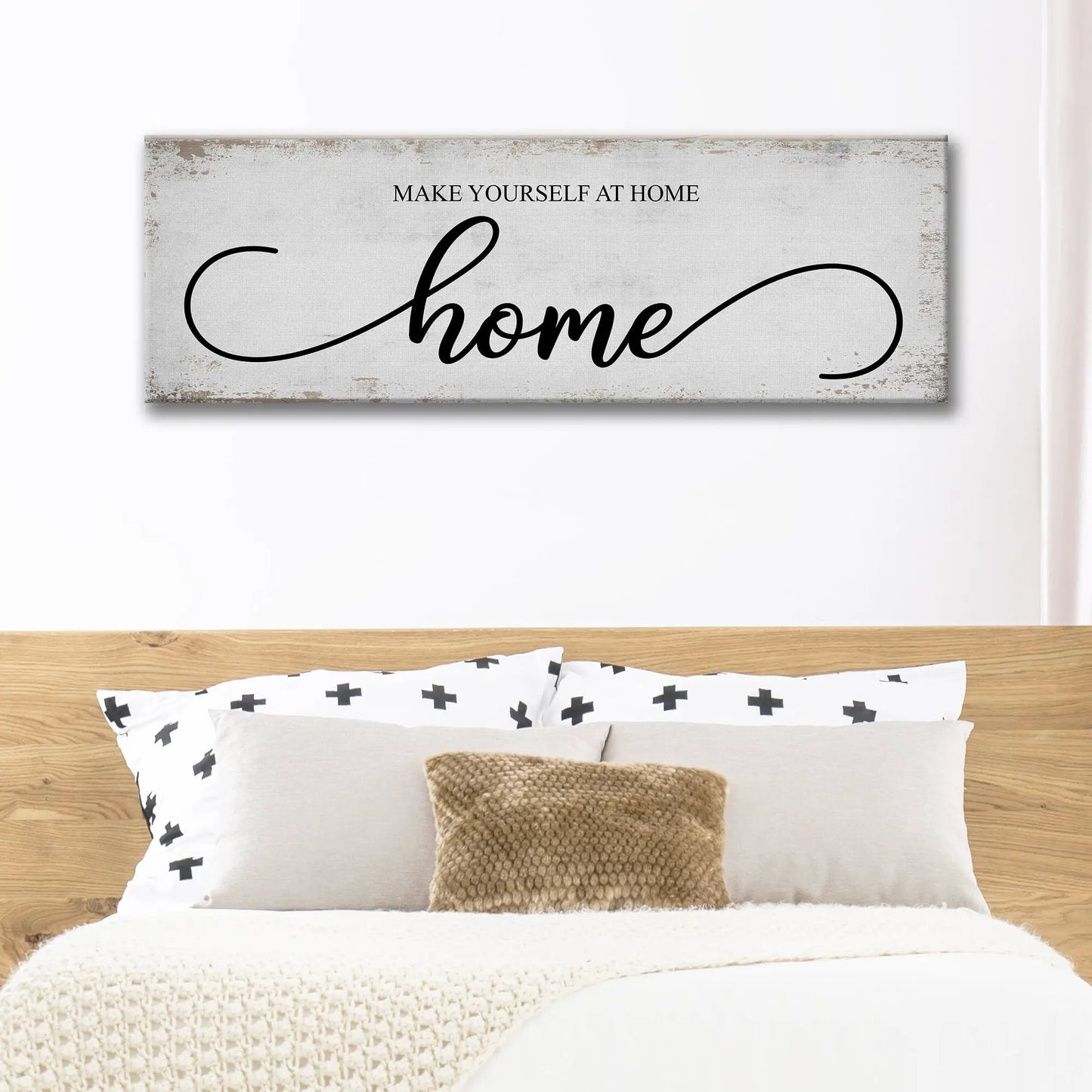 Canvas sign Make Yourself At Home with bold black script home on distressed gray background on Tampa Home & Garden Store