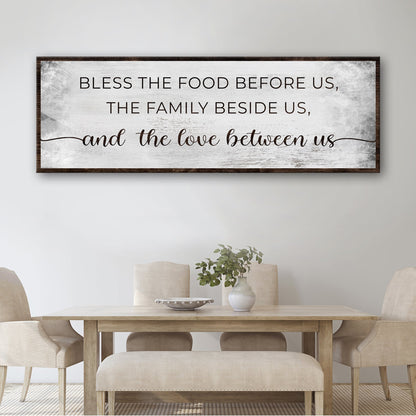 Bless The Love Between Us Sign canvas with distressed white background and dark wood frame on Tampa Home & Garden Store