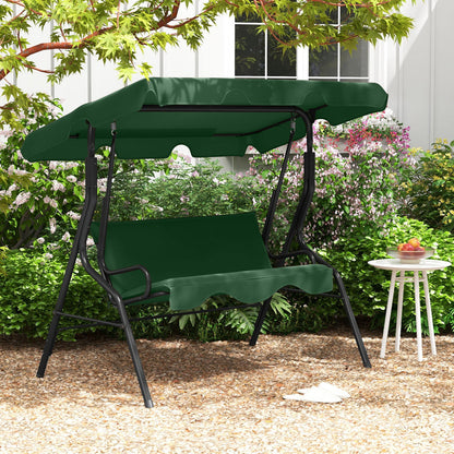 Three-seat outdoor patio canopy swing with green fabric and black frame in a garden setting on Tampa Home & Garden Store
