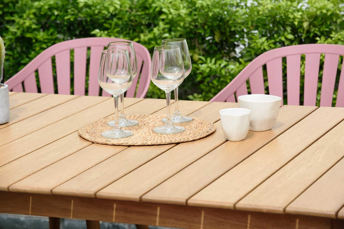 Nassau Rectangular Hardwood Table LifestyleGarden US wood finish with wine glasses on placemat on Tampa Home & Garden Store