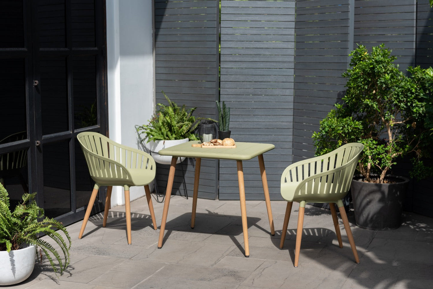 Nassau Carver Armchairs in Sage Green Social Plastic, 2pc outdoor chairs with wood legs on Tampa Home & Garden Store