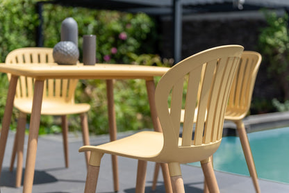 Nassau Side Chair Honey Yellow Social Plastic outdoor chairs set of 2 by LifestyleGarden US on Tampa Home & Garden Store