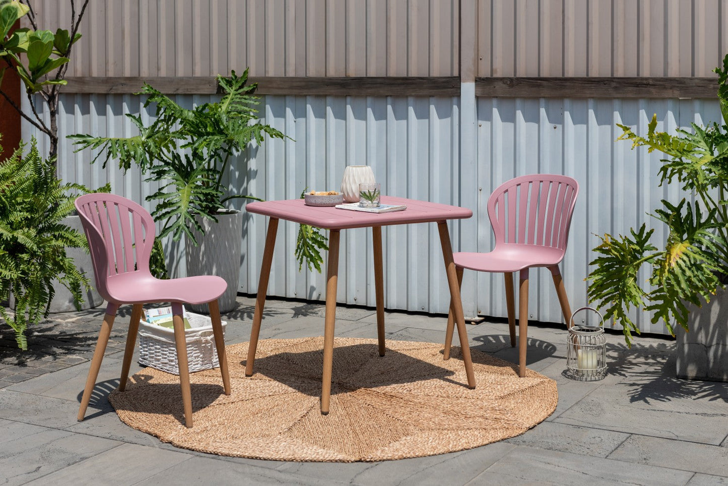 Nassau Square Table Peony Pink Social Plastic outdoor table with two chairs LifestyleGarden on Tampa Home & Garden Store