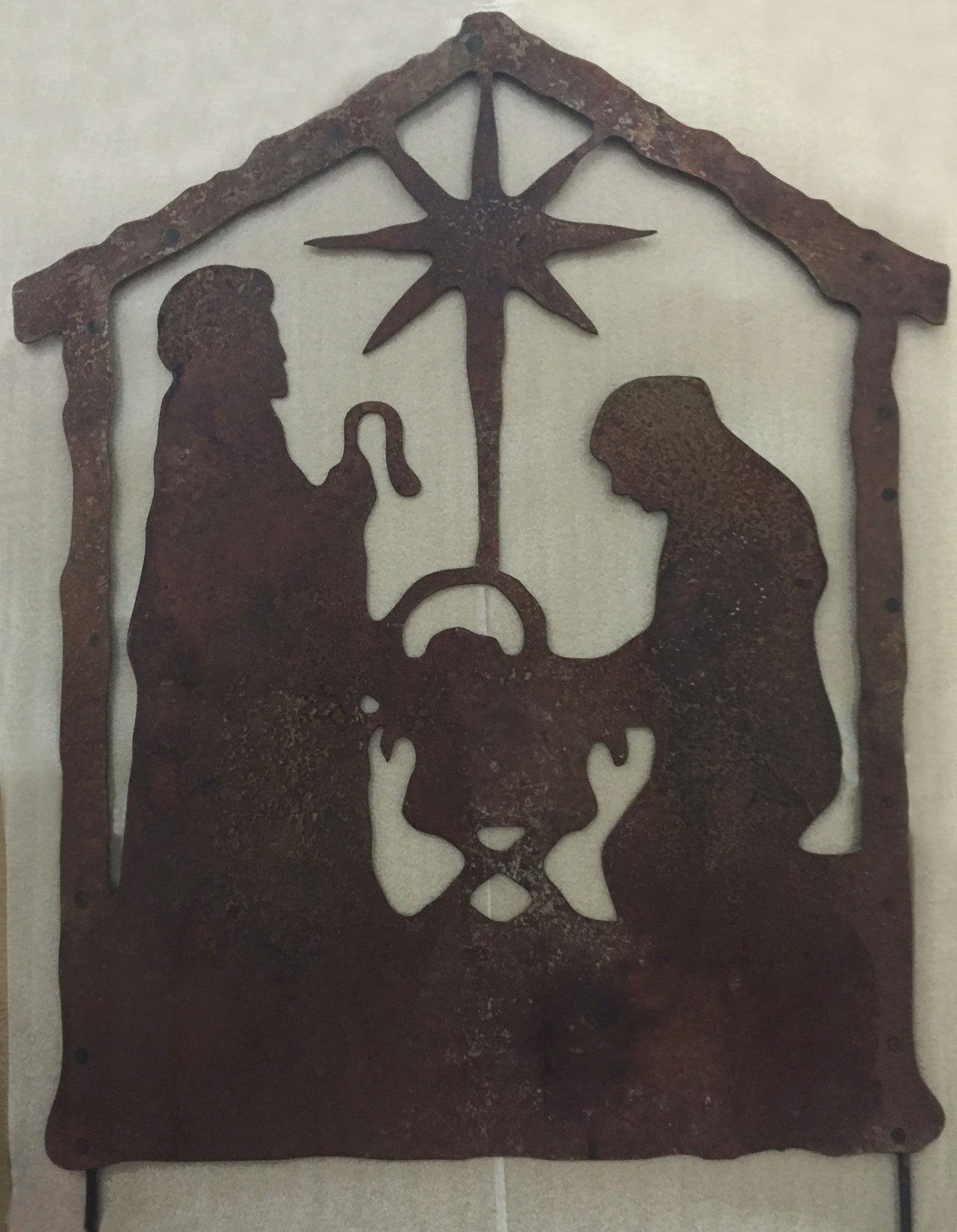 Nativity Scene Outdoor rusted metal silhouette with star arch and Mary and Joseph figures on Tampa Home & Garden Store
