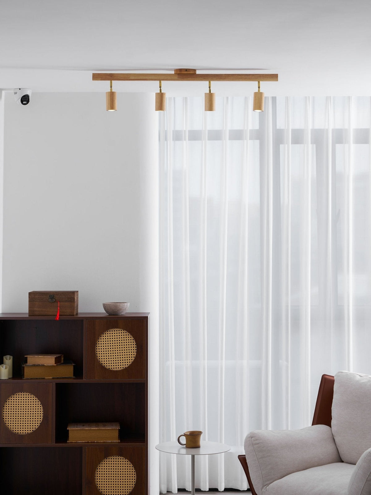 Grain wood shade track lighting fixture with four adjustable heads by Moktan Sabai in warm wood on Tampa Home & Garden Store