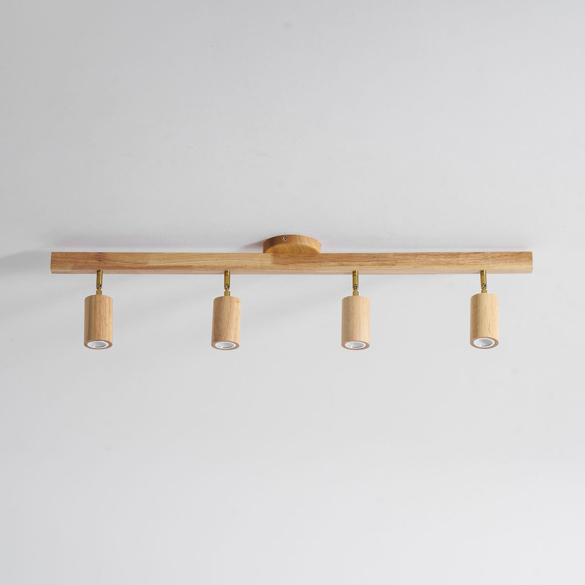 Grain wood shade track lighting fixture by Moktan Sabai with four adjustable heads in natural oak on Tampa Home & Garden Store