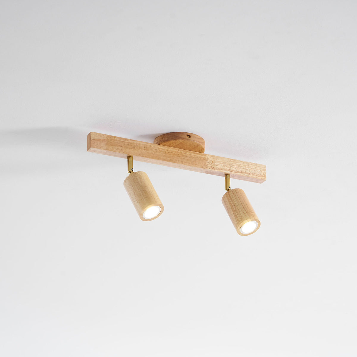 Grain wood shade track lighting fixture with adjustable heads, natural wood and brass accents on Tampa Home & Garden Store